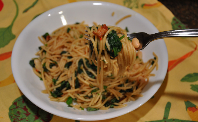 Spaghetti with white beans, spinach, and bacon
