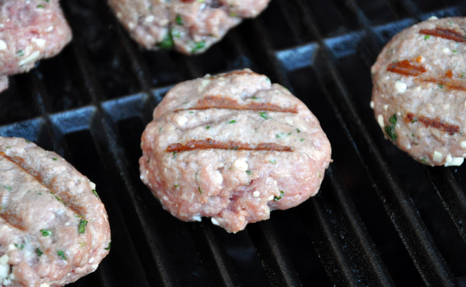 Lamb sausage with mint, feta, and garlic and dill garlic yogurt sauce