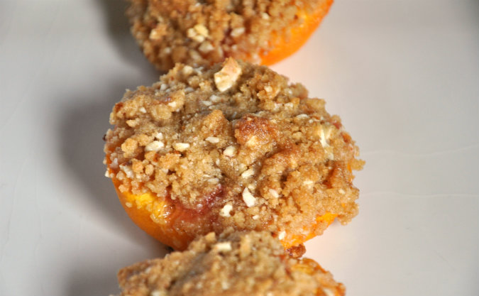 Roasted peaches with vanilla wafer, almond, and brown sugar crumble
